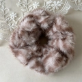 Detailed close-up of plush brown leopard print scrunchie with soft faux fur texture - Pink Zebra Pattern (5974862436715)