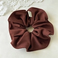 French vintage dark reddish-brown scrunchie with handmade label on beige background - Brown Red