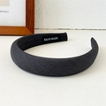 Deep grey padded sponge headband in woven fabric with handmade label details - Dark Gray