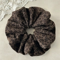 Close-up of a velvet leopard print scrunchie with soft texture and vintage aesthetic - Coffee Double Layer