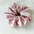 Pink satin scrunchie with embossed rose pattern and soft elegant silk sheen - Camellia Pink