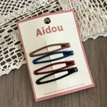 Set of four water-drop hair clips in dark glossy colors on a white product card - Curved Bow Style