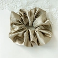 Champagne gold satin scrunchie with 3D floral embossing and glossy silk texture - Camellia Khaki