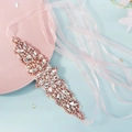 Detailed view of bridal belt with rhinestones, pearls and soft pink chiffon ribbon - Rose Gold