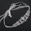 Luxury bridal headband with leaf rhinestones and white organza ribbon on black background - Silver