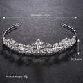Elegant silver bridal tiara with floral rhinestones and vintage scroll design for wedding - Silver