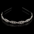 Elegant silver leaf headband with shimmering clear rhinestones on a sleek black background - Silver