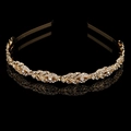 Vintage golden leaf headband featuring sparkling crystal rhinestones on black background - Gold