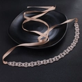 Handmade bridal rhinestone belt with floral crystal pattern on champagne satin ribbon - Rose Gold