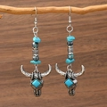 Boucles d'oreilles bohèmes en turquoise avec pendentif crâne de vache sur branche - Décoration tête de taureau