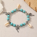 Pulsera bohemia de cuentas estilo océano con piedras turquesas, conchas y palmeras - Turquesa