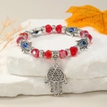 Pulsera de cuentas rojas Mano de Fátima con detalles plateados y amuletos de ojo azul turco - Rojo
