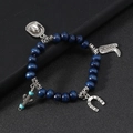 Western cowboy style beaded bracelet set with blue wooden beads and silver lucky charms - Navy Blue