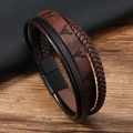 Detail of multi-layer leather bracelet featuring bull head print and black metal buckle - Dark Brown