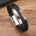 Detail of men's multilayer black leather bracelet with silver metal plate and magnetic clasp - Black Leather + White Metal