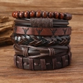 Detail shot of multi-layer leather bracelet set with bull head charm on rustic wood - Bull Head Leather Pattern