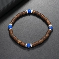 Bracelet fait main en perles de coco avec pierres turquoises et espaceurs blancs - Pierre bleu royal naturelle