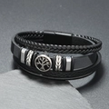 Detail of multi-layer leather bracelet featuring a silver Tree of Life charm and magnetic clasp - Gray
