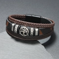 Close-up of tree of life charm on multilayer braided leather bracelet with magnetic clasp - Coffee