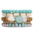 Set de bracelets bohèmes multicouches avec perles bleues et breloque pompon blanc - Style à glands et emblème de soleil (Style D)