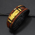 Macro shot of multi-layer leather bracelet with gold cobra snake charm and magnetic clasp - Light Brown Gold
