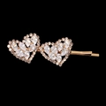 Détail d'une pince à cheveux dorée avec doubles cœurs en strass et pierres brillantes - Barrette Coeur Pierres d'Imitation Or (HS-J6445G)