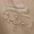 Handmade bridal hair vine with gold wire, white flowers and crystals on a brown surface - Handmade Floral Gold Hairband (HS-J4643)