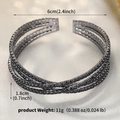 Dettaglio del bracciale crossover a quattro strati con strass neri e larghezza 1,8 cm - Stile Nero (BS-J5578BLK)