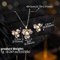 Detail view of gold flower jewelry set with pearls and zircon on black glove background - Gold Cherry Blossom (NS-J6555G)