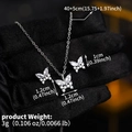 Detailed view of silver butterfly necklace and earrings set with dimensions on black glove - Silver Butterfly (NS-J6559S)