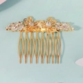 Exquisite detailed view of golden bridal hair comb featuring crystal flowers and marquise leaf accents - Two Flowers (HS-J7396G)