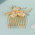 Detailed close-up of golden flower bridal hair comb with sparkling crystal rhinestones - Three Flowers (HS-J7397G)
