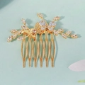 Detailed close-up of golden bridal hair comb with a hollow butterfly and sparkling zircons - Zircon Butterfly (HS-J7398G)