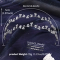 Dettagli della fascia da sposa a forma di foglia con dimensioni e peso del prodotto - Stile Cerchietto a Forma di Foglia (HS-J7381S)