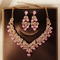 Detail of bridal jewelry set with pink rhinestones and gold-plated necklace earrings - Gold Pink Rhinestone Style (NS-J6524GPINK)