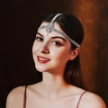 Macro detail of bridal silver rhinestone headband with floral centerpiece and tassels - Silver (HS-J6833S)