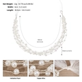 Detalle de diadema de perlas hecha a mano con tejido de cobre y lazos de gasa blanca - Plateado