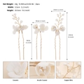 Dettaglio delle forcine per capelli con fiori in ceramica fatti a mano e perle - Oro