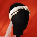 Detail of bridal hair comb with pearls and white mesh veil on a gold metal wire base - Pearl Headband Tulle Veil (HS-J6434)