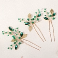 Three-piece set of golden bridal hair pins with green crystals and leaf motifs - Gold and Dark Green Crystal Style (HS-J7066G)