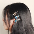 Golden astronomical star and moon hair clips set with blue enamel and pearls on hair - Dark Blue Universe Starry Sky Style (HS-J6522)