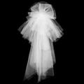 Detailed view of layered white tulle bridal veil with oversized bow on dark background - Multi-layer Fluffy Bow Headpiece (HS-J7176WHITE)
