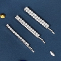 Three-piece silver metal hair clip set with sparkling rhinestones on blue texture - Silver Row Rhinestone Three-Piece Style (HS-J6553S)