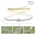 Elegant ivory satin bridal belt featuring luxury rhinestone crystal flower patterns - Hollow Floral Style / Silver