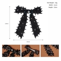 Detalle del lazo negro para el cabello con cristales y dimensiones de 11x13cm - Negro