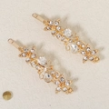 Detail of vintage gold flower hair clips with sparkling rhinestones and butterfly design - HS-J6595G