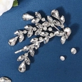Close-up of bridal leaf hair clip with marquise rhinestones on blue velvet background - HS-J6612S