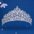 Elegant silver bridal tiara with pear-cut rhinestones on deep blue background - TS-J3211S