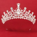Elegant silver alloy tiara with sparkling rhinestones and teardrop stones on red background - TS-J3002S