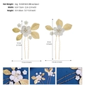 Detailed view of floral hair pin set with white matte flowers and golden leaves - Gold Leaf Hairpin (HS-J7022G)